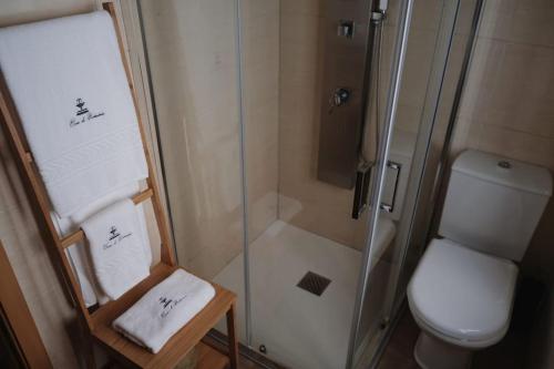 a bathroom with a shower and a toilet at Casa do Fontanario em Viana do Castelo in Viana do Castelo
