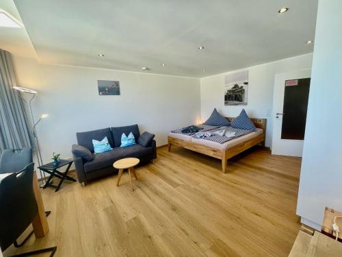 Postel nebo postele na pokoji v ubytování Strandblick im Haus Seeblick Bismarckstraße
