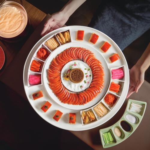 a plate of food on a table with a plate of food at Galaxy Macau in Macau