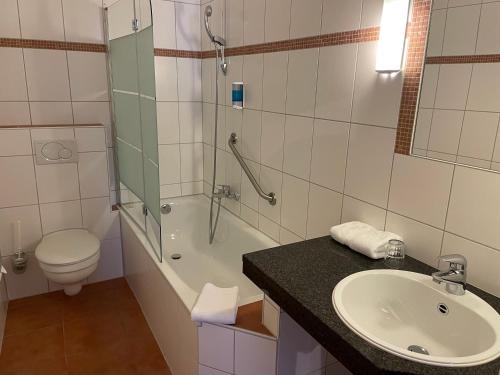 Un baño de Dom Hotel