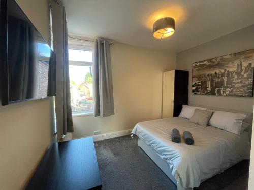 Postel nebo postele na pokoji v ubytování Delightful home in Manchester