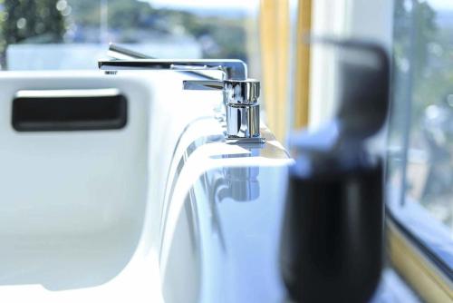a close up of a sink in a vehicle at Ferienhaus mit Panoramablick in Bühlertal
