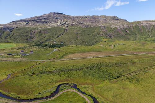 an aerial view of a valley with a mountain at Geysir Cabins - Golden Circle Cabin only 800m from Geysir in Selfoss
