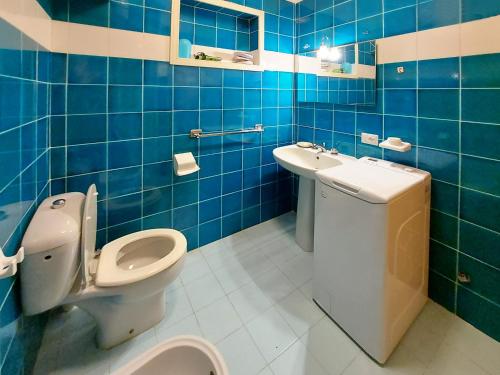 Ванна кімната в Casa Paola Cala Lupo