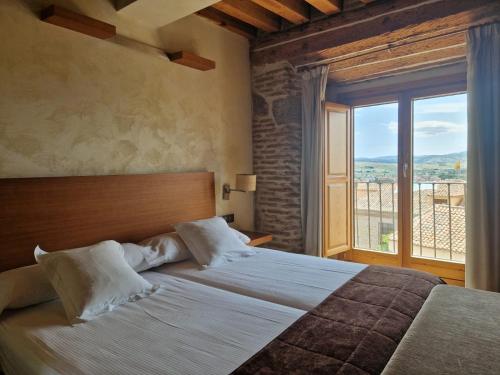 Postel nebo postele na pokoji v ubytování Hotel Las Leyendas