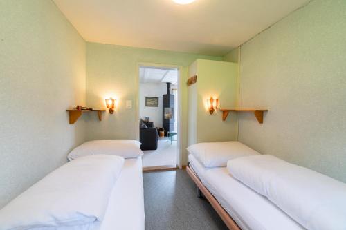 Una cama o camas en una habitación de Wiesel