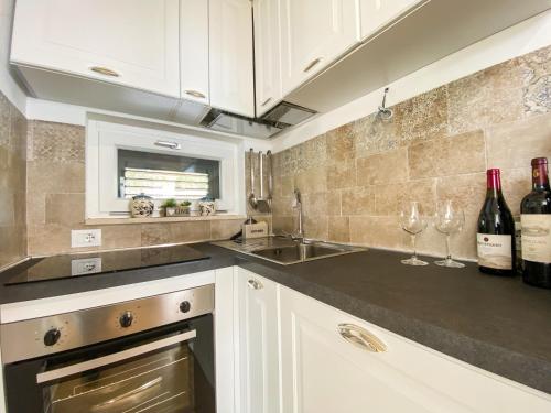 Køkken eller tekøkken på Il Tramonto by Great Stays