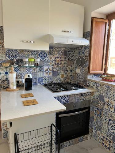 Η κουζίνα ή μικρή κουζίνα στο Piccolo Sogno