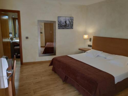 Letto o letti in una camera di Hotel Las Leyendas