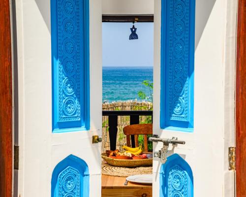 a room with a view of the ocean at Salaam Space in Muscat