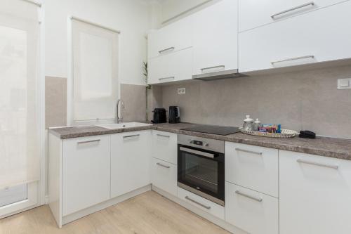 Kuchyňa alebo kuchynka v ubytovaní Tiramisu by halu! Apartments