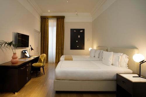 Posteľ alebo postele v izbe v ubytovaní Elizabeth Unique Hotel | a Member of Design Hotels™