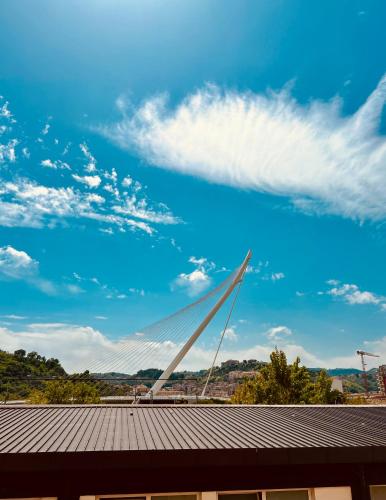 a bridge in the sky over a building at Sunrise Home in Cosenza