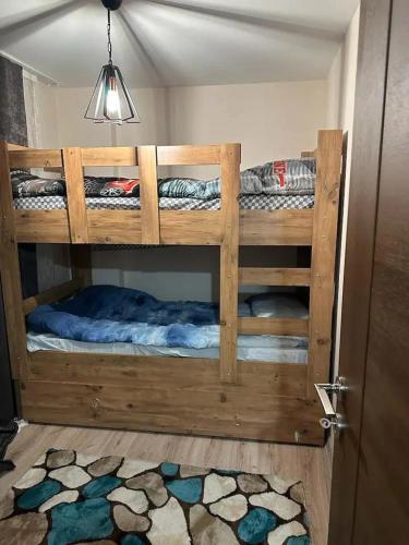 a room with two bunk beds in a room at new flat in Mugla