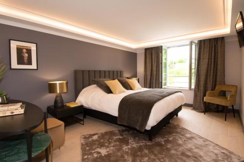 Postel nebo postele na pokoji v ubytování Gîte L'Escale des Aulnes