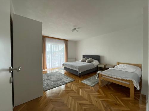 Ένα ή περισσότερα κρεβάτια σε δωμάτιο στο BORIĆI