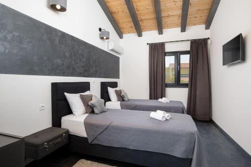 Katil atau katil-katil dalam bilik di Villa Frola by IstriaLux