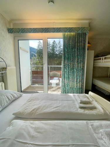 Postel nebo postele na pokoji v ubytování Apartment Berghof Ellmau
