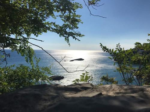 a view of the ocean from a bluff at Villa Marinero in Ulcinj