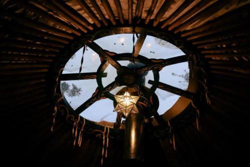 a chandelier hanging from the ceiling of a building at Eisa Yurt in York