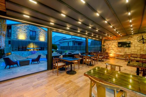En restaurant eller et andet spisested på STONE HOUSE BUTİK OTEL