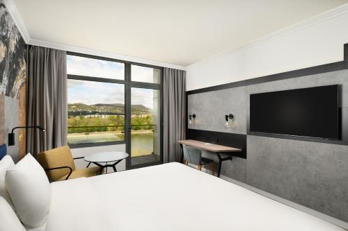 Postel nebo postele na pokoji v ubytování Danubius Hotel Helia