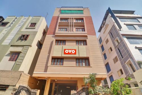 a building with a yes sign in front of it at Hotel O R Square in Hyderabad