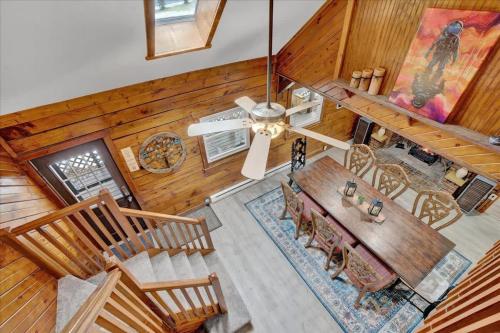 an overhead view of a living room with a table and chairs at Cabin in Long Pond Gameroom Pool Table in Long Pond