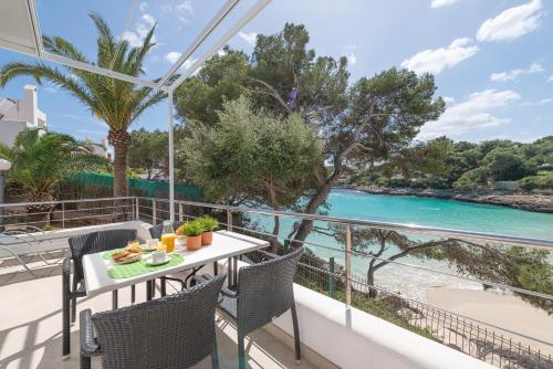Foto Apartamento en primera linea de la playa en Cala Dor 4