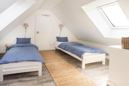 Katil atau katil-katil dalam bilik di AnnaNordsee – Appartements