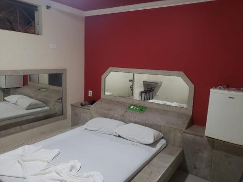 Postel nebo postele na pokoji v ubytování Alamo Motel