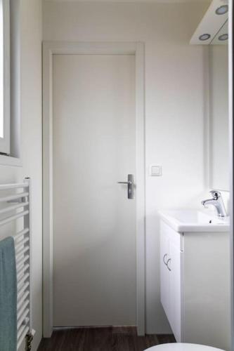 Koupelna v ubytování Gezellig modern chalet midden op de Veluwe