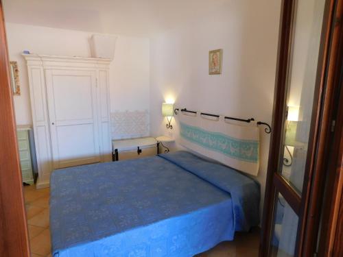 Ένα ή περισσότερα κρεβάτια σε δωμάτιο στο Appartamento Residence Mirice