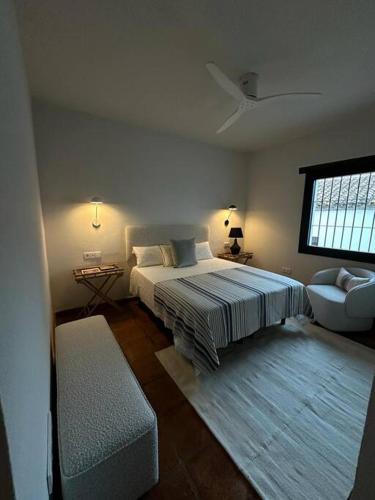 A bed or beds in a room at Apartment in Andalusian White Village