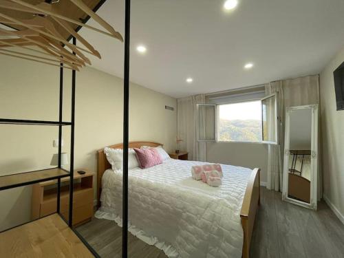 Postel nebo postele na pokoji v ubytování Refúgio da Mariana - Gerês