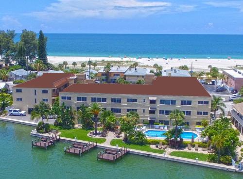 an aerial view of a resort and the beach at Treasure Island Beach, FL Waterfront Condo in St. Pete Beach