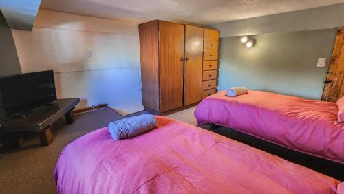 Posteľ alebo postele v izbe v ubytovaní La gringa 2