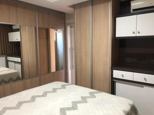 Postel nebo postele na pokoji v ubytování Apartamento confortável quadra mar