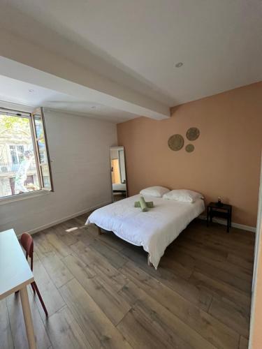 Cama o camas de una habitación en Charmante maison de ville