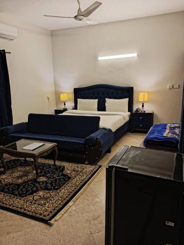 Llit o llits en una habitació de Infinity Villa