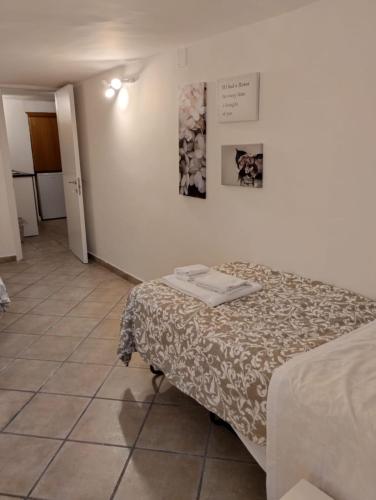 Postel nebo postele na pokoji v ubytování Amedeo Square
