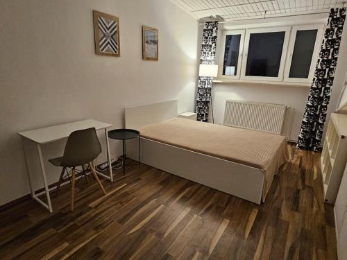 Posteľ alebo postele v izbe v ubytovaní Przestronny Apartament z szybkim WiFi