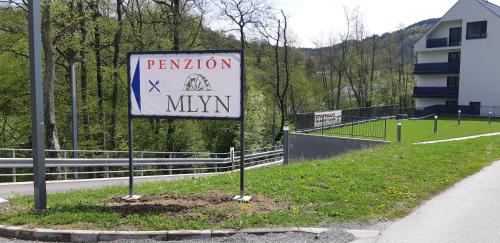 a sign on the side of a road at Penzion Mlyn - Bystra in Brezno