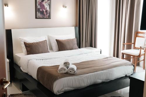 Postel nebo postele na pokoji v ubytování Hotel Kristal