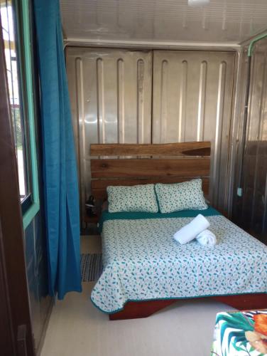 Postel nebo postele na pokoji v ubytování Container House Cahuita