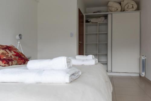 Ένα ή περισσότερα κρεβάτια σε δωμάτιο στο Gente del Sur - Amundsen