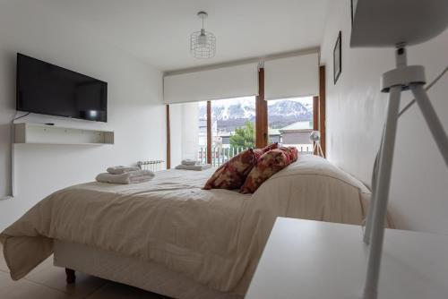 Ένα ή περισσότερα κρεβάτια σε δωμάτιο στο Gente del Sur - Amundsen