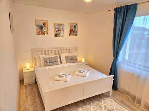 Ένα ή περισσότερα κρεβάτια σε δωμάτιο στο Cozy SoRaDa 1 apartment