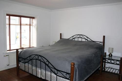 A bed or beds in a room at Árblik-Home away from home