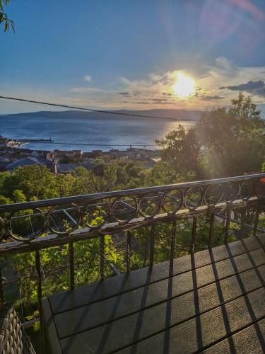 a view of the ocean from a balcony at Josipa & Jelena Apartment in Senj